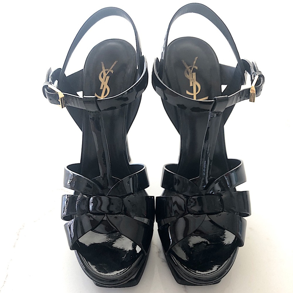 Saint Laurent's black patent sandal.